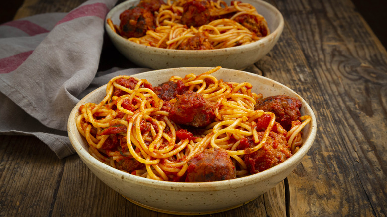 bowls of spaghetti and meatballs