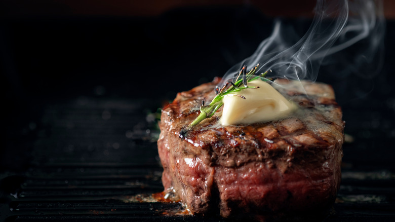 Melting butter on steak