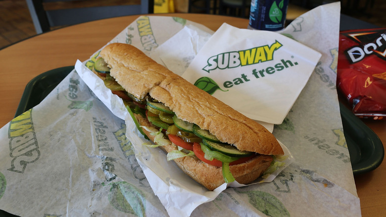 Subway sandwich on white paper