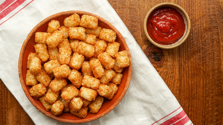 Bowl of tater tots and ketchup