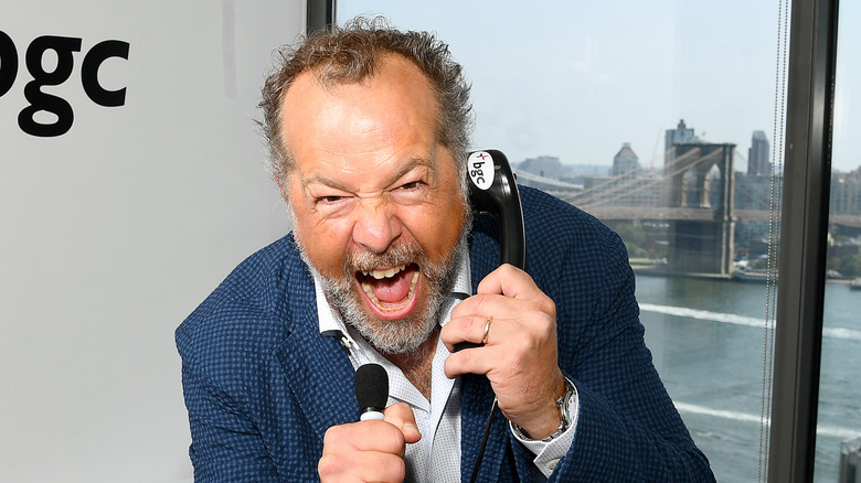 David Costabile posing with phone