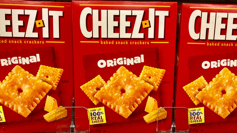 Three boxes of Cheez-It on a shelf