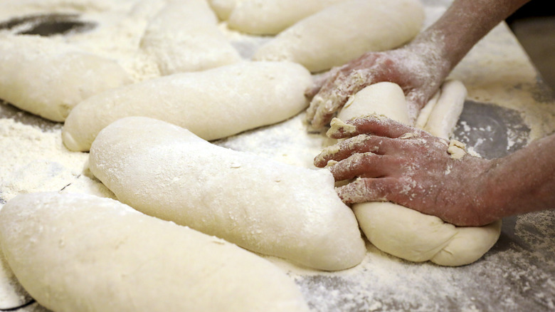 Hands in dough