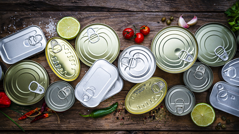 canned foods on wooden table