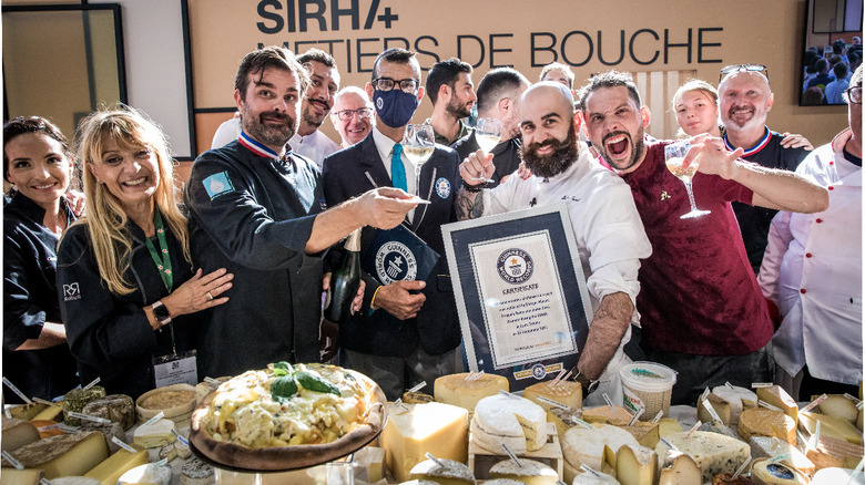 Record pizza makers holding certificate