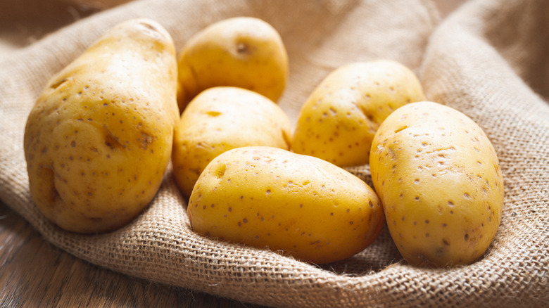 Yukon Gold potatoes on burlap