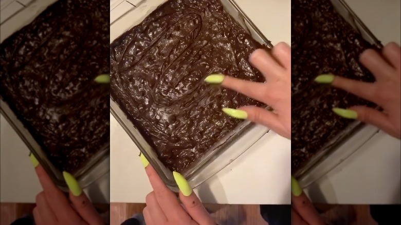 nails touching brownies