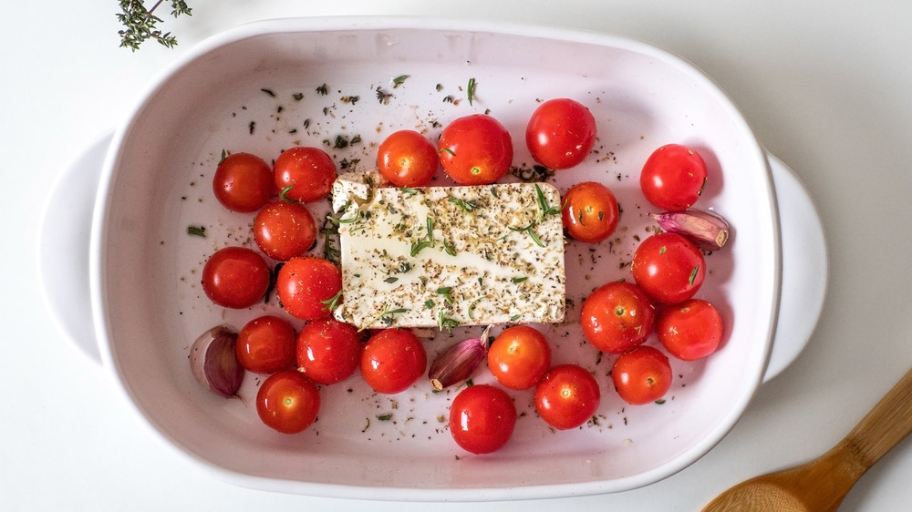 Feta pasta in white ceramic baking dish