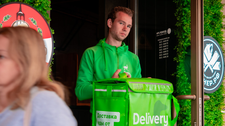 A delivery worker with insulated bag