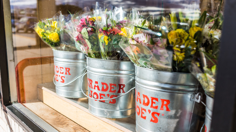 Trader Joe's tin buckets with flower bouquets for sale