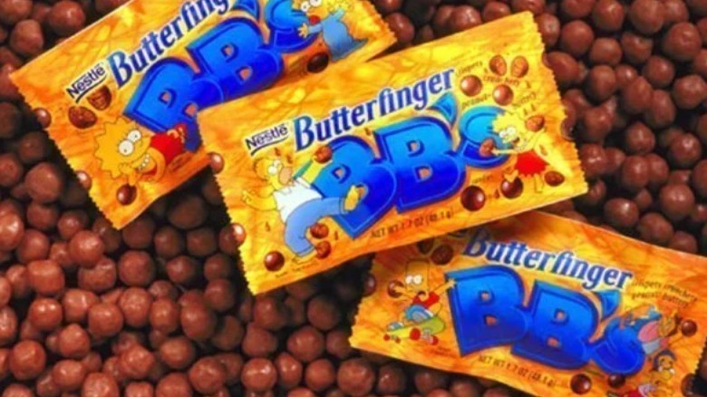 Packages of Butterfinger BB's sitting on a pile of candy