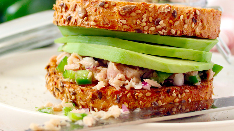 Whole wheat tuna salad sandwich with avocado