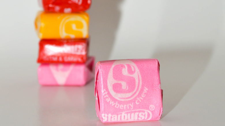 pink starburst candy in wrapper