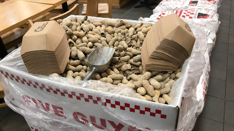 A box of Five Guys' peanuts and trays