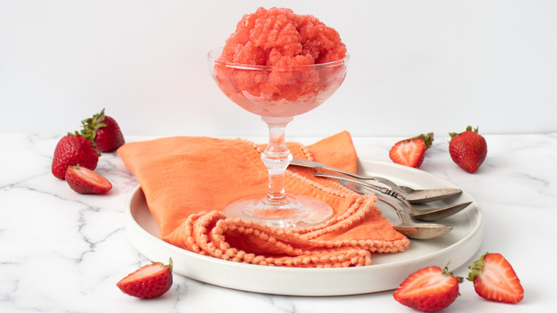 Strawberry rosé granita on tray with spoons