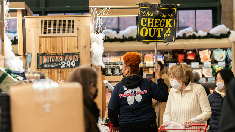 people inside of a trader joes