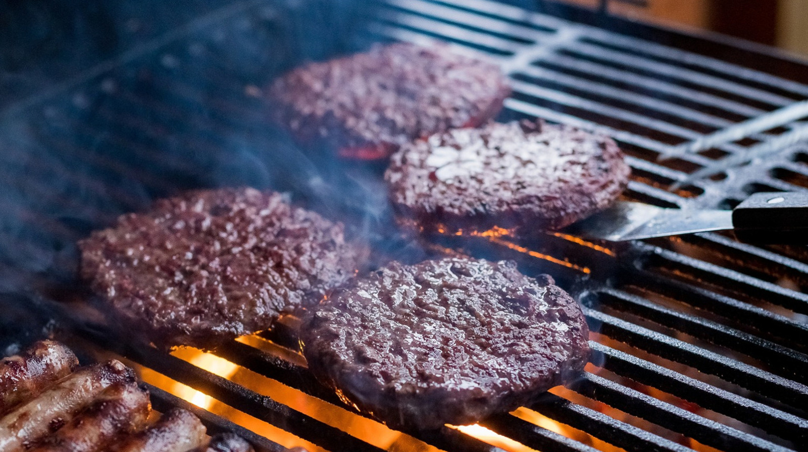 Why You Need To Let Grilled Burgers Rest