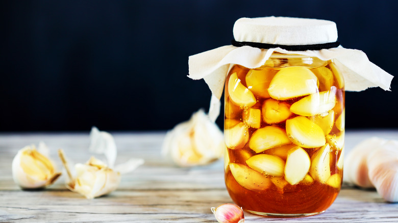 Pickled honey garlic in jar