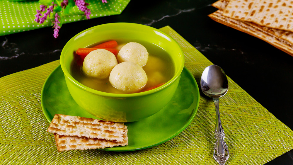 Matzo balls in a green bowl