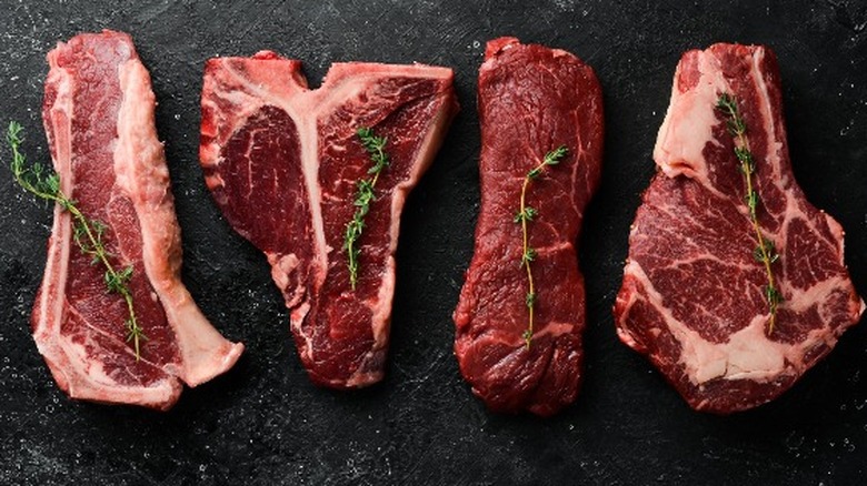 Raw cuts of steak