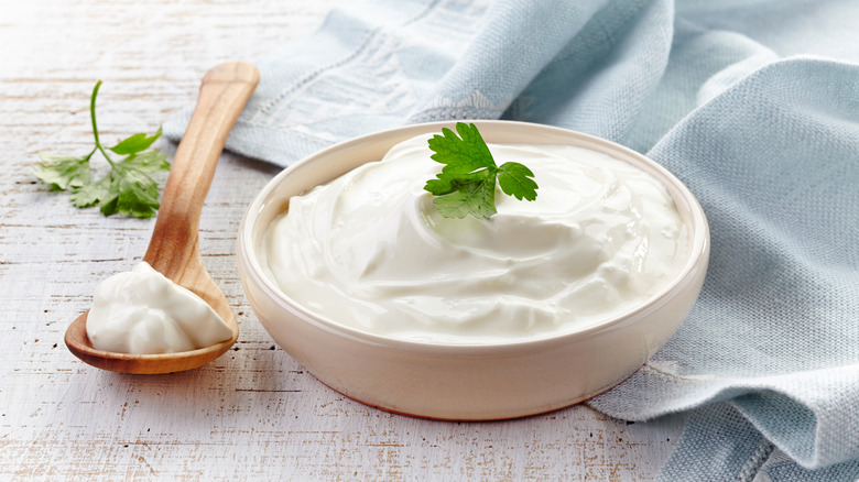 bowl of sour cream with garnish