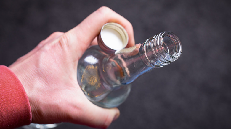 cook pouring vodka