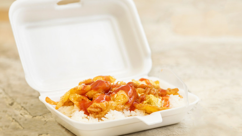 Styrofoam takeout container full of food