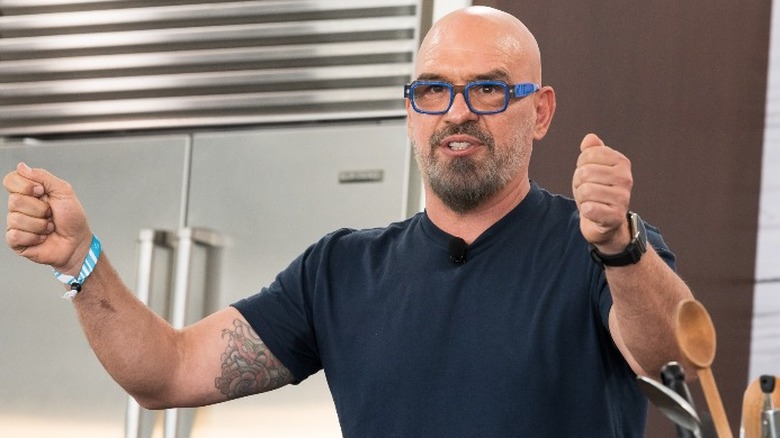 Michael Symon leading a cooking demo