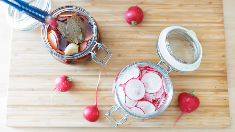 Radishes in pickling jars