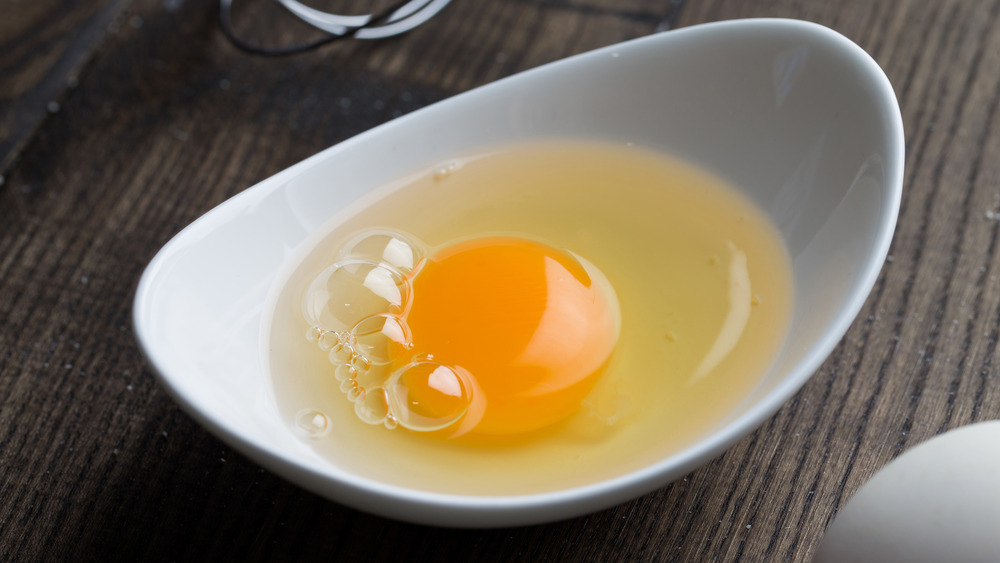 Raw egg in bowl