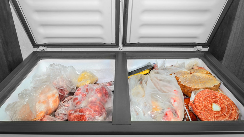 A deep freezer filled with frozen items