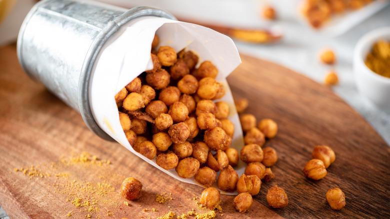 Crispy chickpeas in tin food dish