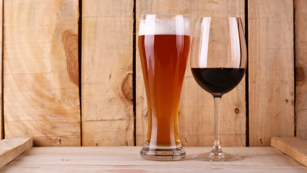 Beer and red wine in glass