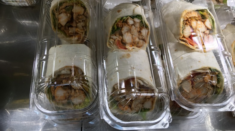 Wraps in plastic containers 