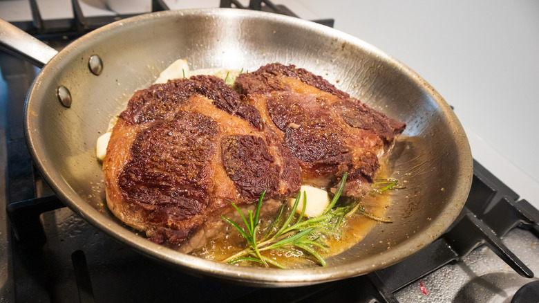 Beef in a stainless steel pan