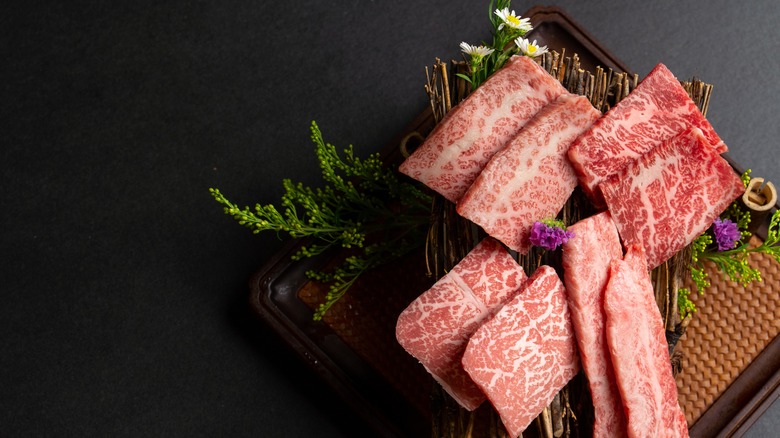 Wagyu steaks on wood plate