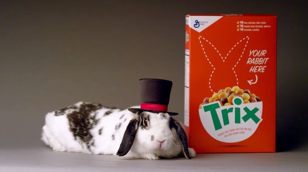 Rabbit in top hat in front of Trix cereal box