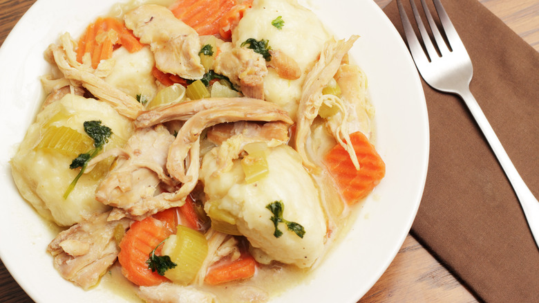 A bowl of chicken and dumplings 