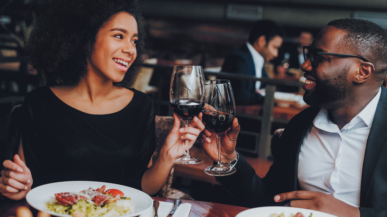 Drinking wine at restaurant