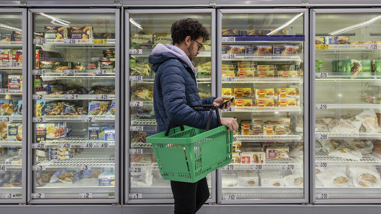 Man in the frozen food aisle