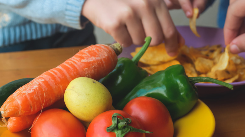 eating chips instead of veggies