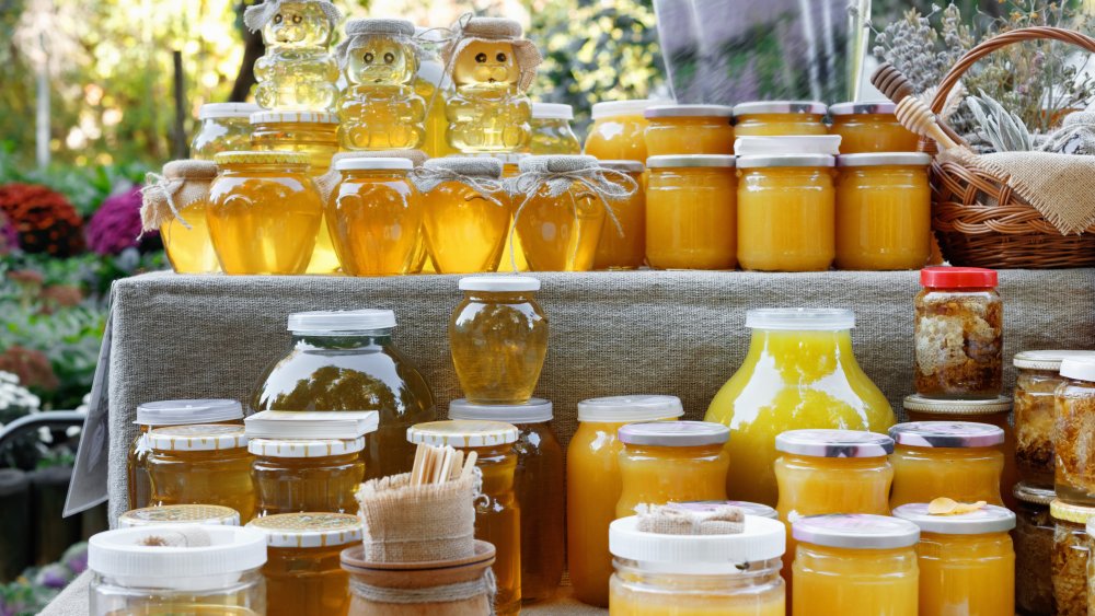 jars of honey on a table 