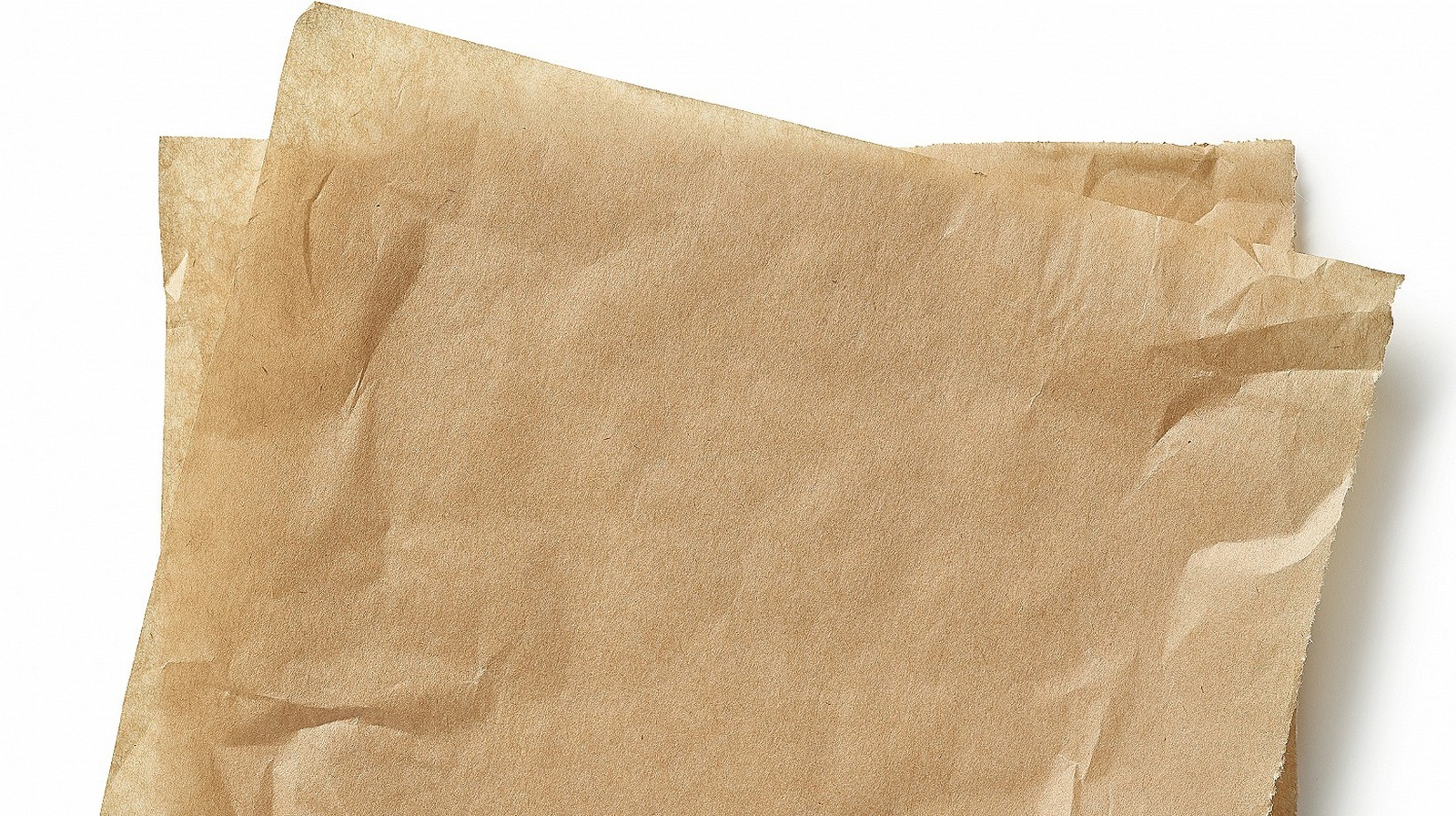 https://www.mashed.com/img/gallery/why-you-should-think-twice-before-frying-in-parchment-paper/l-intro-1677021580.jpg