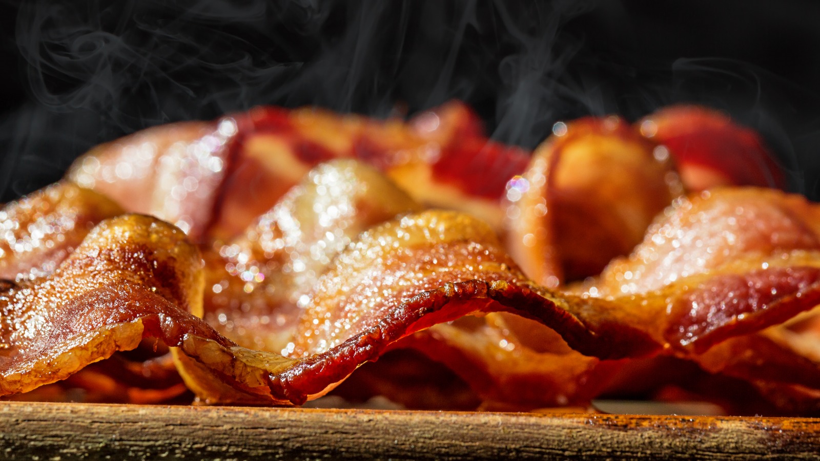 Why You Should Think Twice Before Putting Bacon On The Grill, According ...