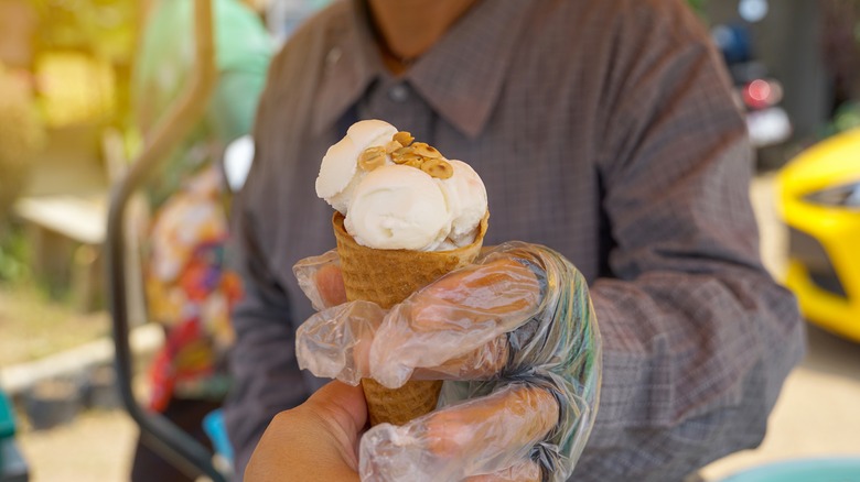 Ice cream with peanuts on top