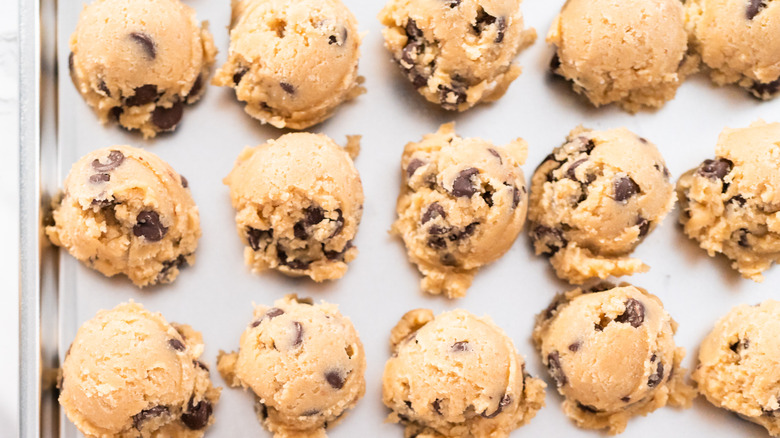 Cookie dough on parchment paper lined tray