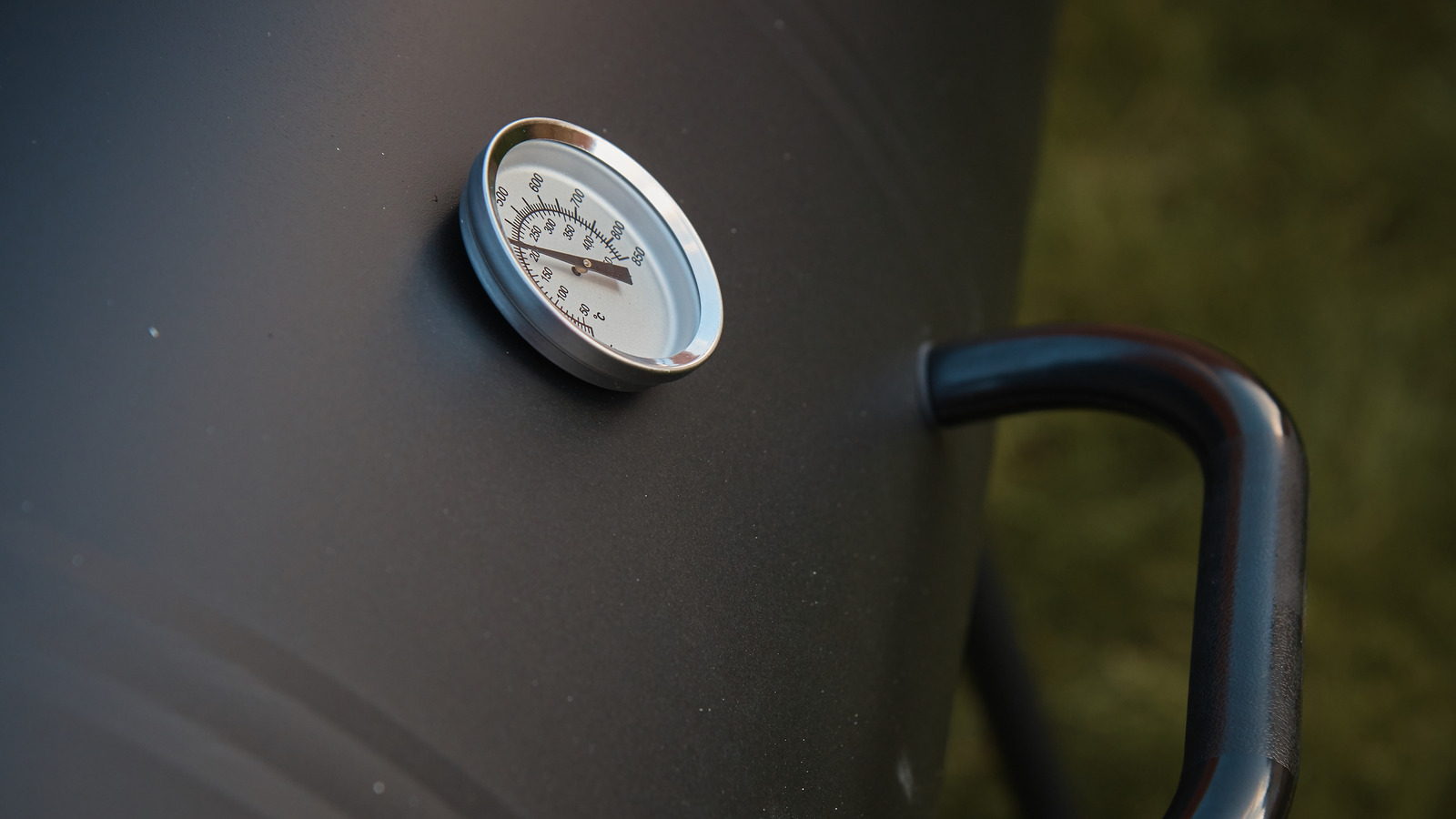 Why It's Time To Stop Trusting The Thermometer Dial On Your Grill