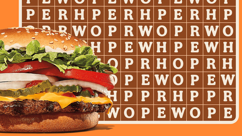 A Whopper in front of a word search puzzle filled with the word "whopper" 