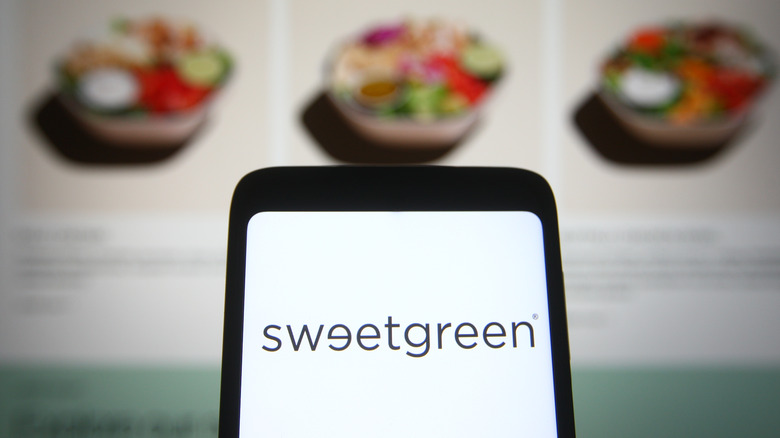 The Sweetgreen logo displayed on a phone