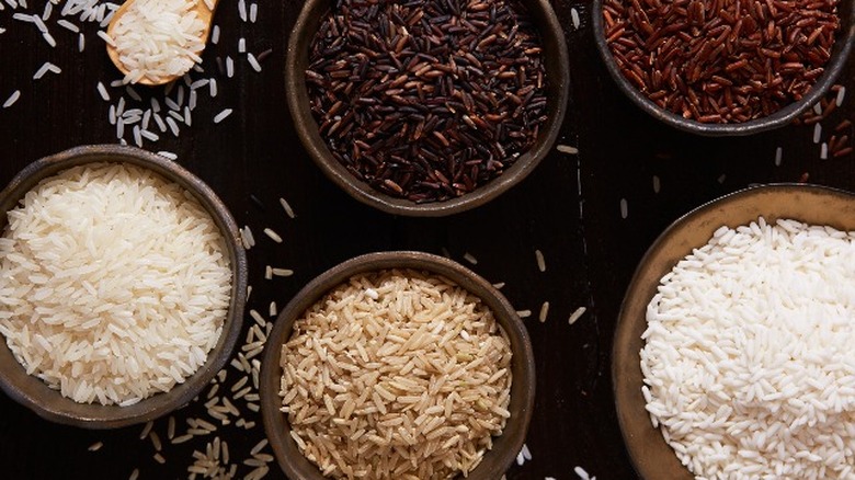 Different kinds of rice in small bowls